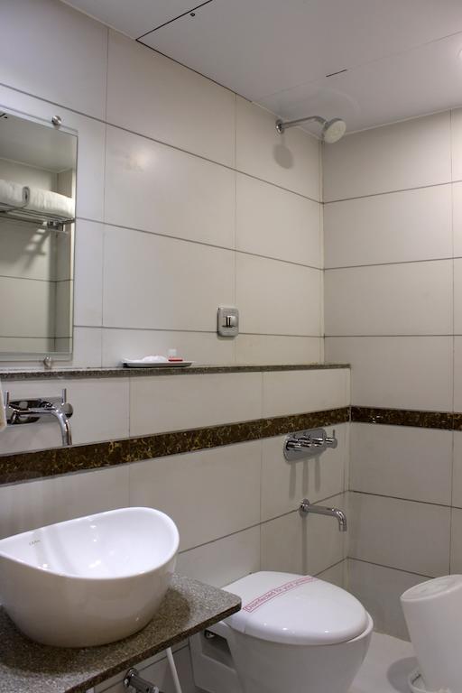 Hotel Ashray Inn Ахмедабад Номер фото